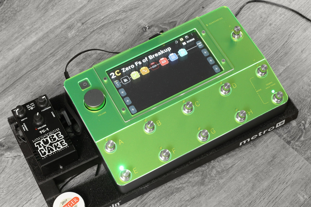Neural DSP Quad Cortex with the neon green ProtectYourGear acrylic shield on a pedalboard